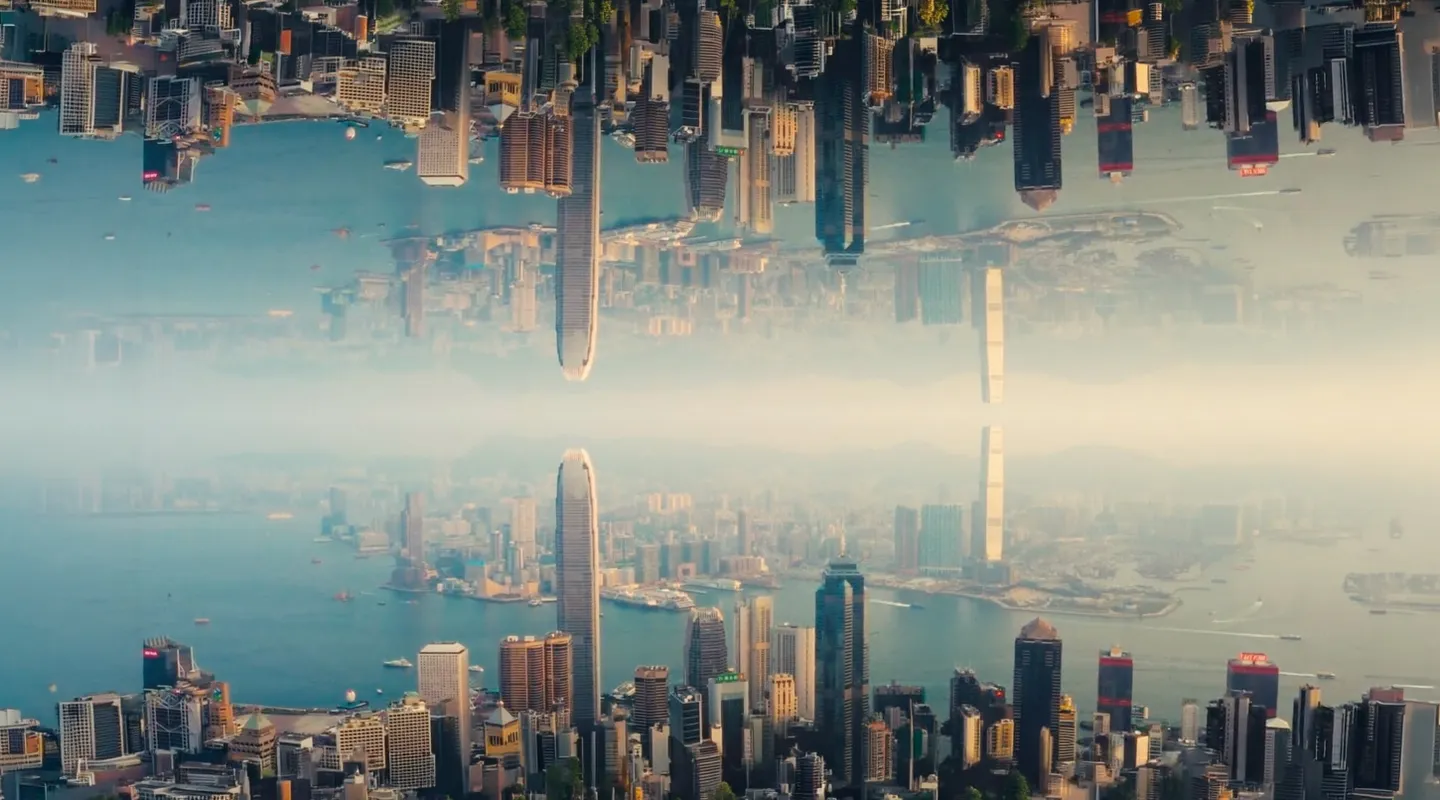 A mega city being shown in aerial view and mirrored upside down