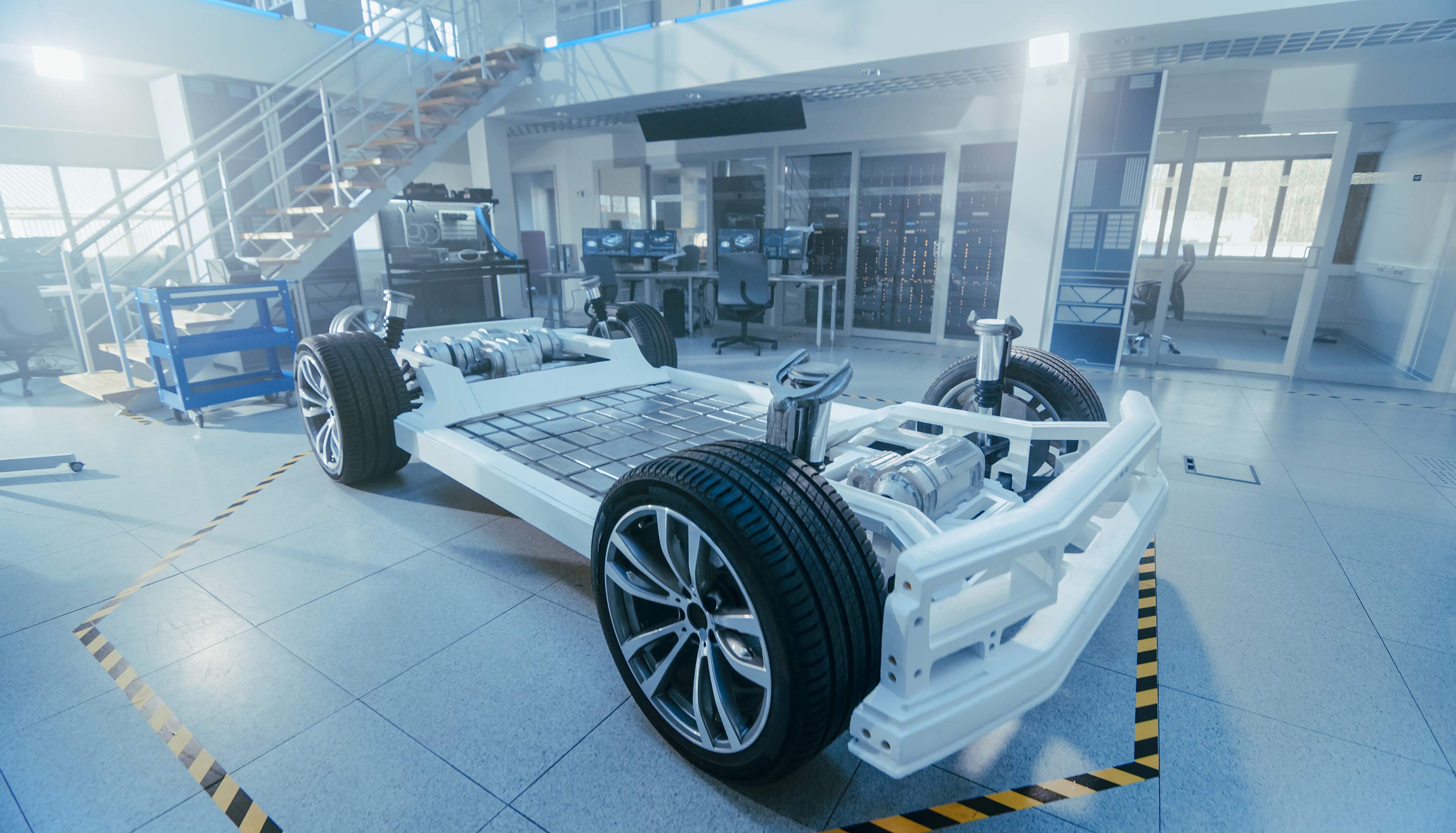 Electric car in mid-production on a high-tech factory line